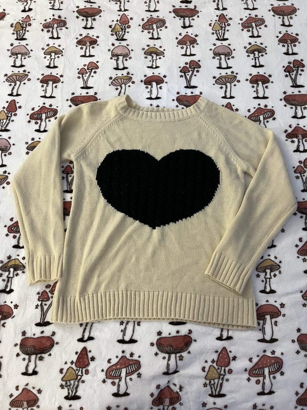 Cream Sweater with Black Heart Graphic